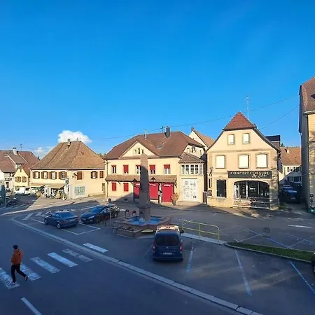 Des Cigognes Au Coeur Du Bourg Апартаменты